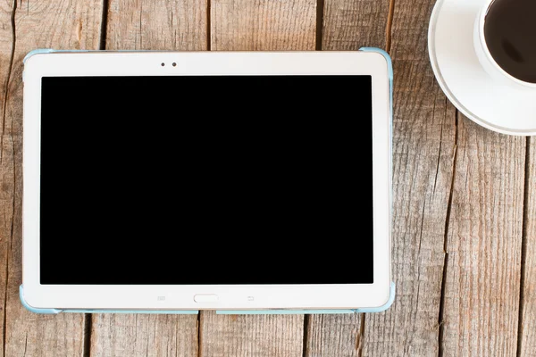 Digital tablet and coffee cup — Stock Photo, Image