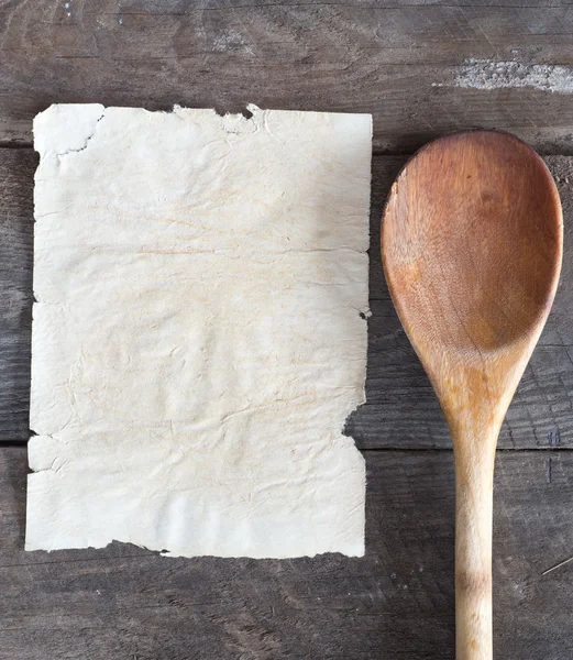 Spoon and paper — Stock Photo, Image