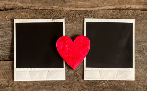 Photo frame and small red heart — Stock Photo, Image