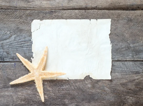 Deniz yıldızı ve kağıt levha — Stok fotoğraf