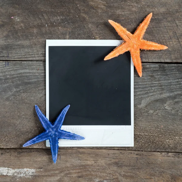 Foto velha e estrelas do mar — Fotografia de Stock