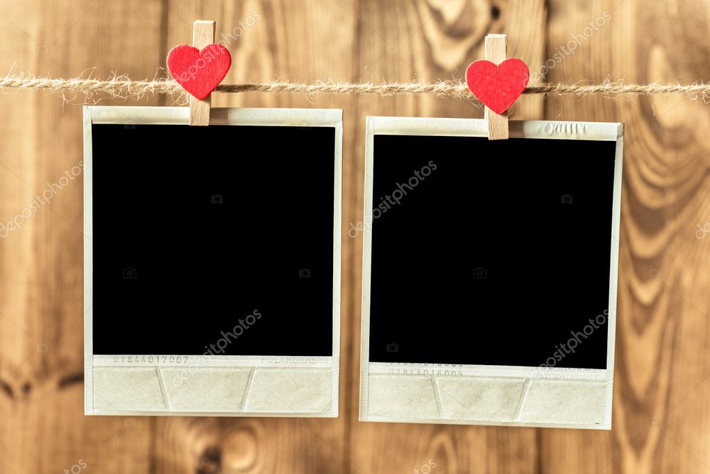 viejo marco de fotos colgadas en el tendedero — Foto de stock © roobcio