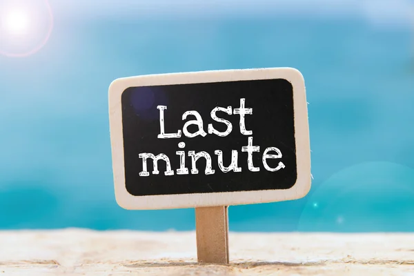 Last Minute a mano su una lavagna — Foto Stock