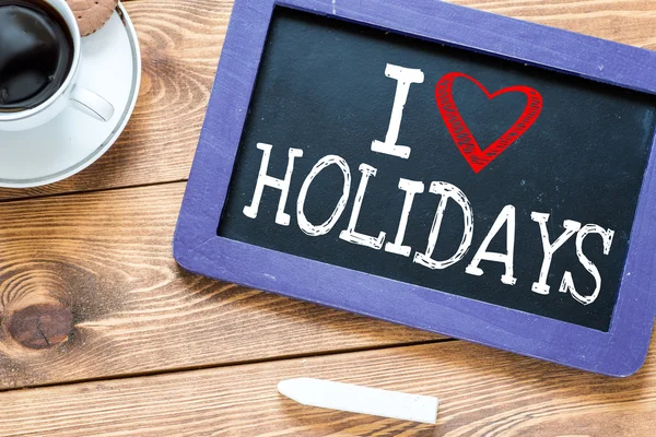 Holiday handwritten with white chalk — Stock Photo, Image