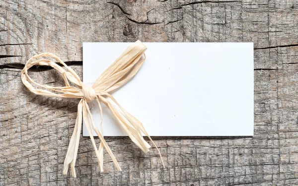 Card on wood — Stock Photo, Image