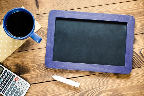 Workspace with blackboard — Stock Photo, Image