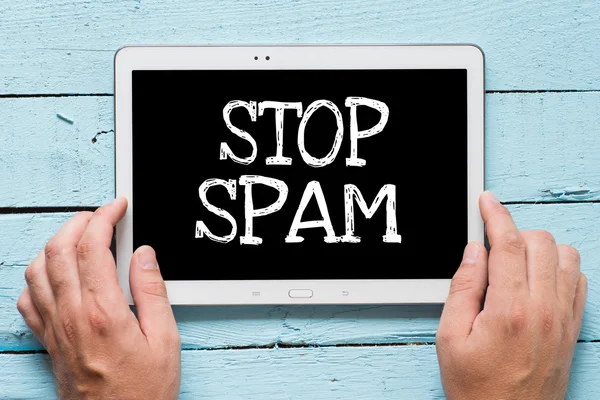 Moderne tablet pc met slogan stop spam — Stockfoto