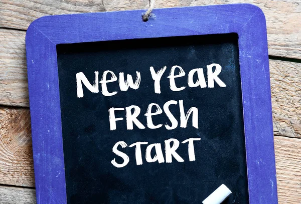 New Year Fresh Start Words Chalk Board Wooden Table Concept — Stock Photo, Image