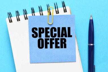 SPECIAL OFFER words written on a small sheet of paper.