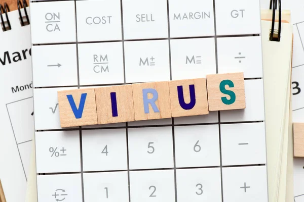 Slovo Virus Uspořádané Dřevěnými Písmeny Kalkulačce — Stock fotografie