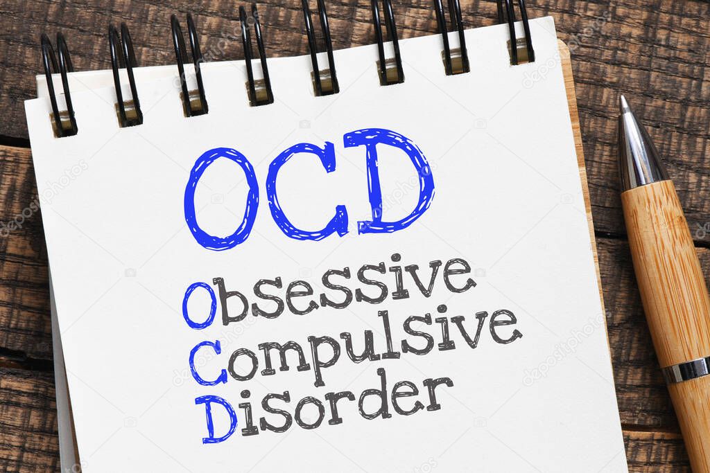 OCD Obsessive Compulsive Disorder written in notebook