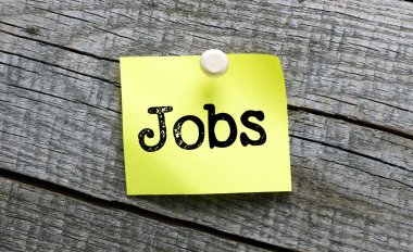 Küçük bir kağıt parçasına iş sözü. İş konsepti.