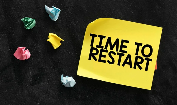 Time Restart Words Yellow Sheet Paper Black Background — Stock Photo, Image