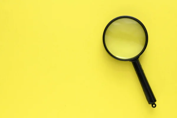 Black Magnifier Yellow Background — Stock Photo, Image