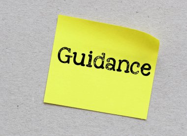 Kılavuz kelimesi küçük bir kağıt parçasında.