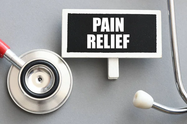 Λέξεις Pain Relief Ένα Μικρό Πίνακα — Φωτογραφία Αρχείου