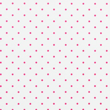 Üzerinde pembe benekler olan beyaz bir kağıt. Arkaplan ya da doku olarak kullanmak için.