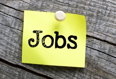 Küçük bir kağıt parçasına iş sözü. İş konsepti.