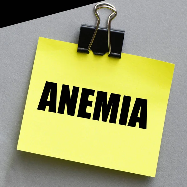 Anemia Wort Auf Einem Kleinen Gelben Blatt Papier Grauem Hintergrund — Stockfoto