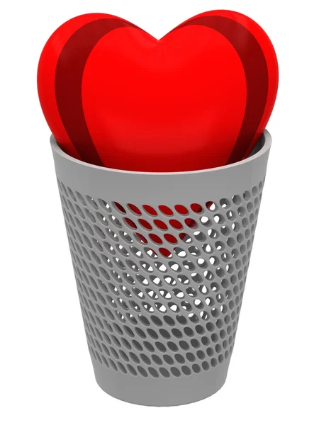 Red heart in a wastebasket — Stock Photo, Image