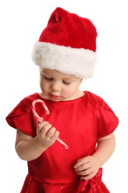 Holding ve şeker kamışı arayan genç çocuk