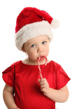 bir Noel candy cane emen bebek