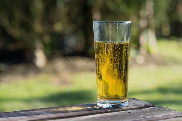 Glass of cider on table — Stock Photo, Image