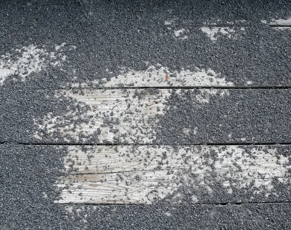 Rock texture on wooden slat — Stock Photo, Image