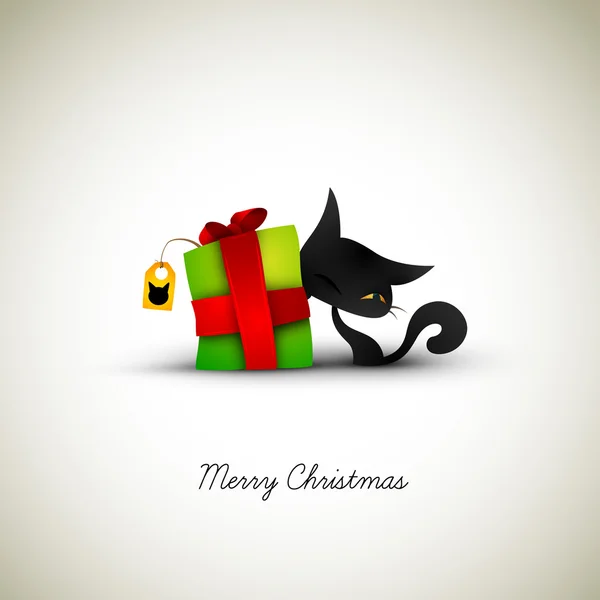 Chaton et boîte cadeau de Noël — Image vectorielle