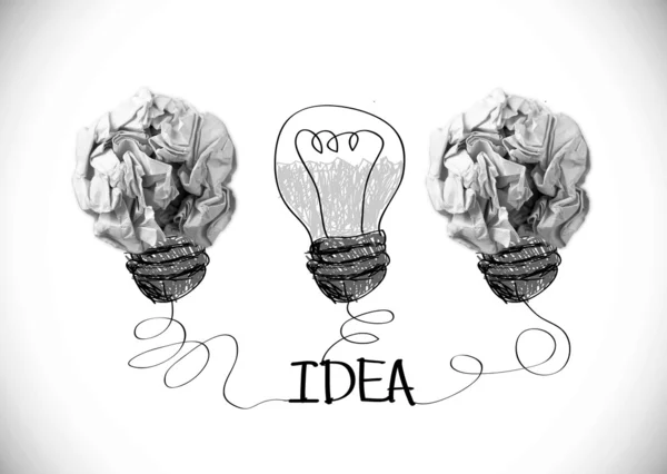 Concept crumpled paper light bulb metaphor — Stock Photo, Image