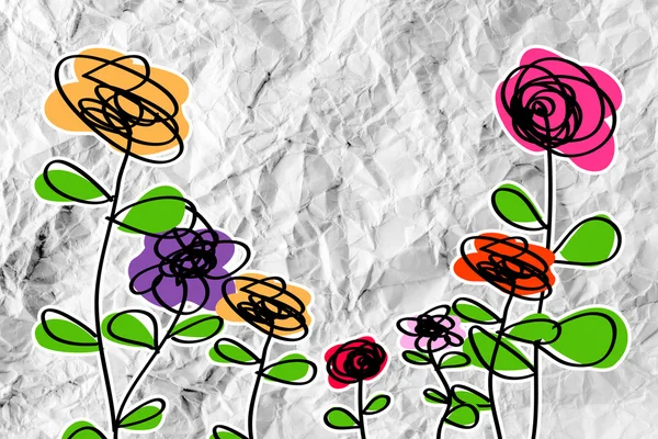 Ontwerp met bloemen op verfrommeld papier — Stockfoto