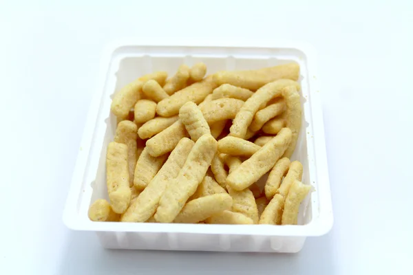 Snack potato chips heaps on a white background — Stock Photo, Image