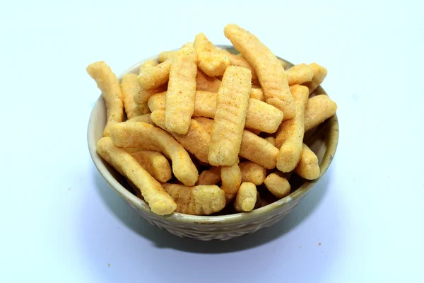 Batatas fritas lanche pilhas em um fundo branco — Fotografia de Stock