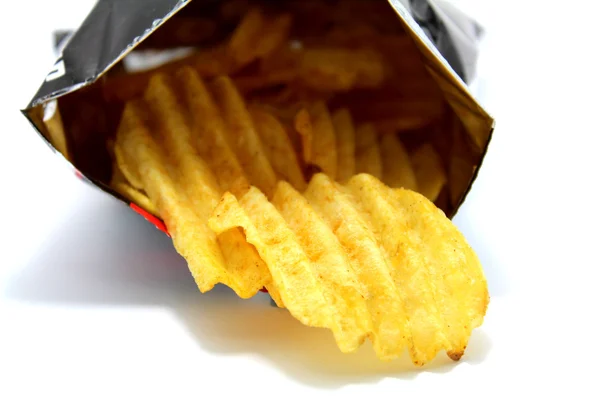 Snack potato chips heaps on a white background — Stock Photo, Image