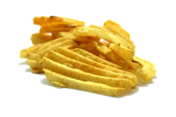 Snack patatas fritas montones sobre un fondo blanco — Foto de Stock