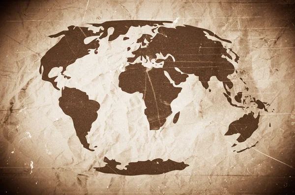 Globe ikon bumi tema ide desain pada kertas kusut — Stok Foto
