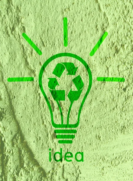 Ideia Ícone de lâmpada na textura da parede design de fundo — Fotografia de Stock