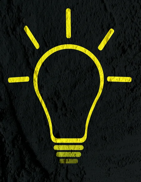 Idé-lampa ikonen på väggen textur bakgrundsdesign — Stockfoto