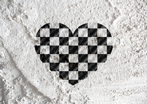 Символ сердца с клетчатым флагом на стене цемента ba
