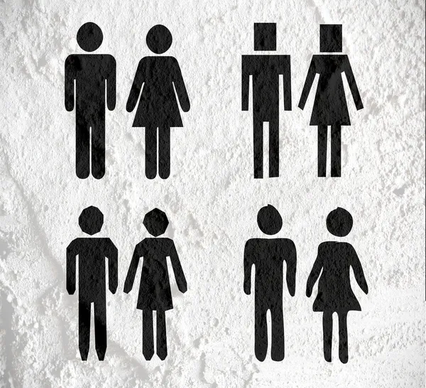 Piktogramm Mann Frau Zeichen Symbole auf Zementwand Textur Hintergrund — Stockfoto