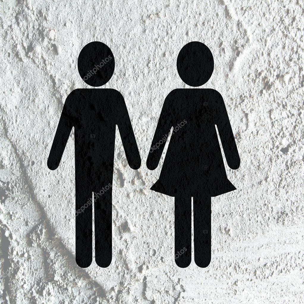 Pictogram Man Woman Sign icons on Cement wall texture background