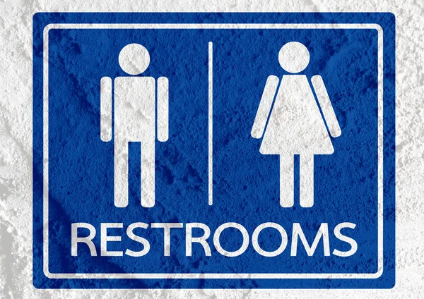 厕所图标和象形图男人女人标志在水泥墙上纹理 — 图库照片