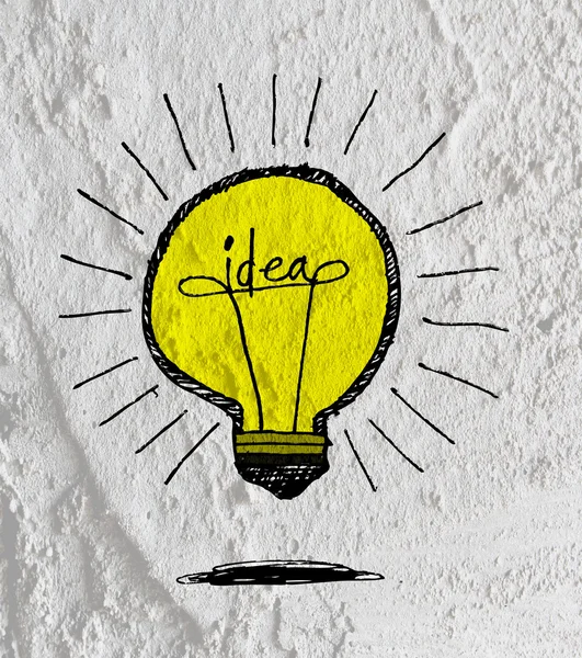 Idé-lampa ikonen på cement vägg textur bakgrundsdesign — Stockfoto