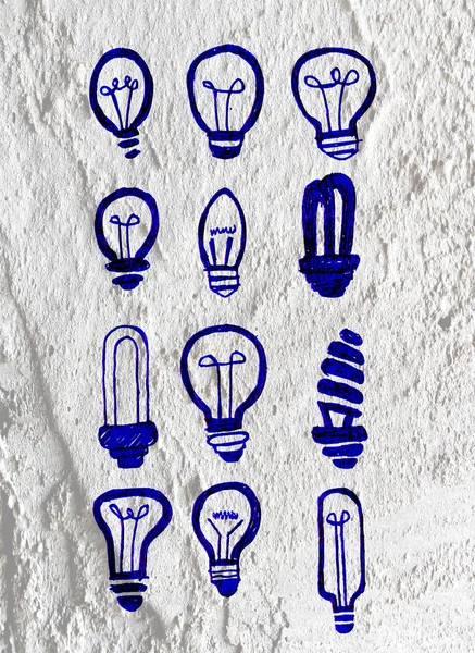 Ideia Ícone da lâmpada de luz no projeto de fundo textura de parede de cimento — Fotografia de Stock