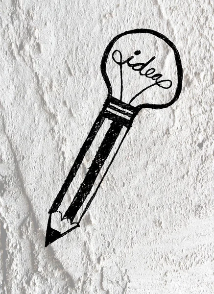Idée Icône ampoule sur le mur de ciment texture fond design — Photo