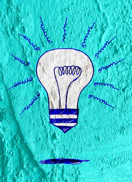 Idea Icona lampadina su cemento parete texture sfondo design — Foto Stock