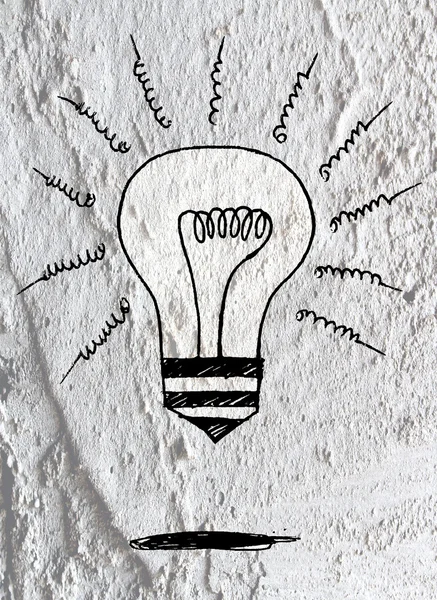 Idea Light bulb icon on Cement wall texture background design — Stock Photo, Image