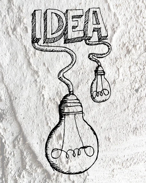 Ideia Ícone da lâmpada de luz no projeto de fundo textura de parede de cimento — Fotografia de Stock