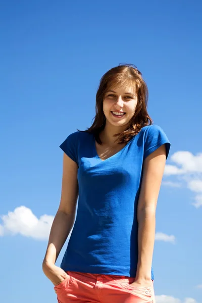 Beautiful young girl smiles — Stock Photo, Image