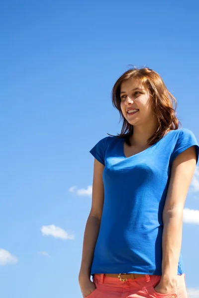 Beautiful young girl smiles — Stock Photo, Image